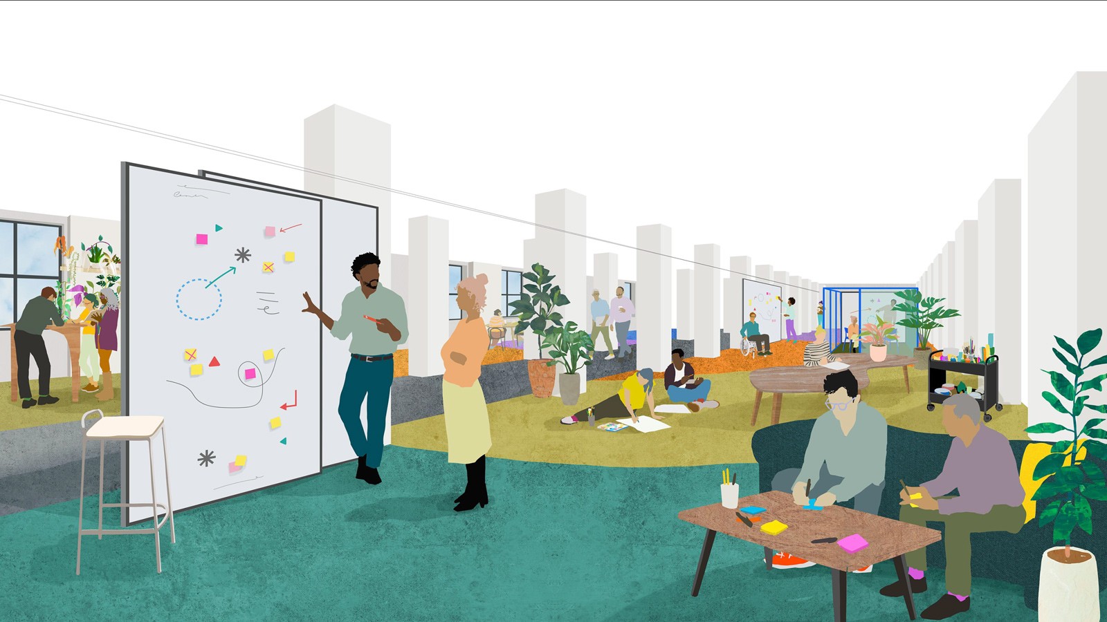 People working together in modular workspaces in a long pillared room